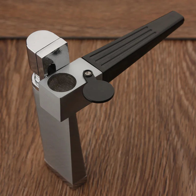 Folding metal pipe lighter showing open position with stash compartment visible