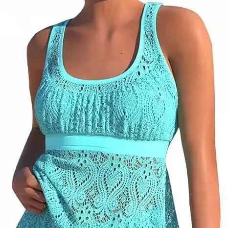 Women's conservative hollow design two-piece swimwear set in solid colour, with sleeveless top and briefs.