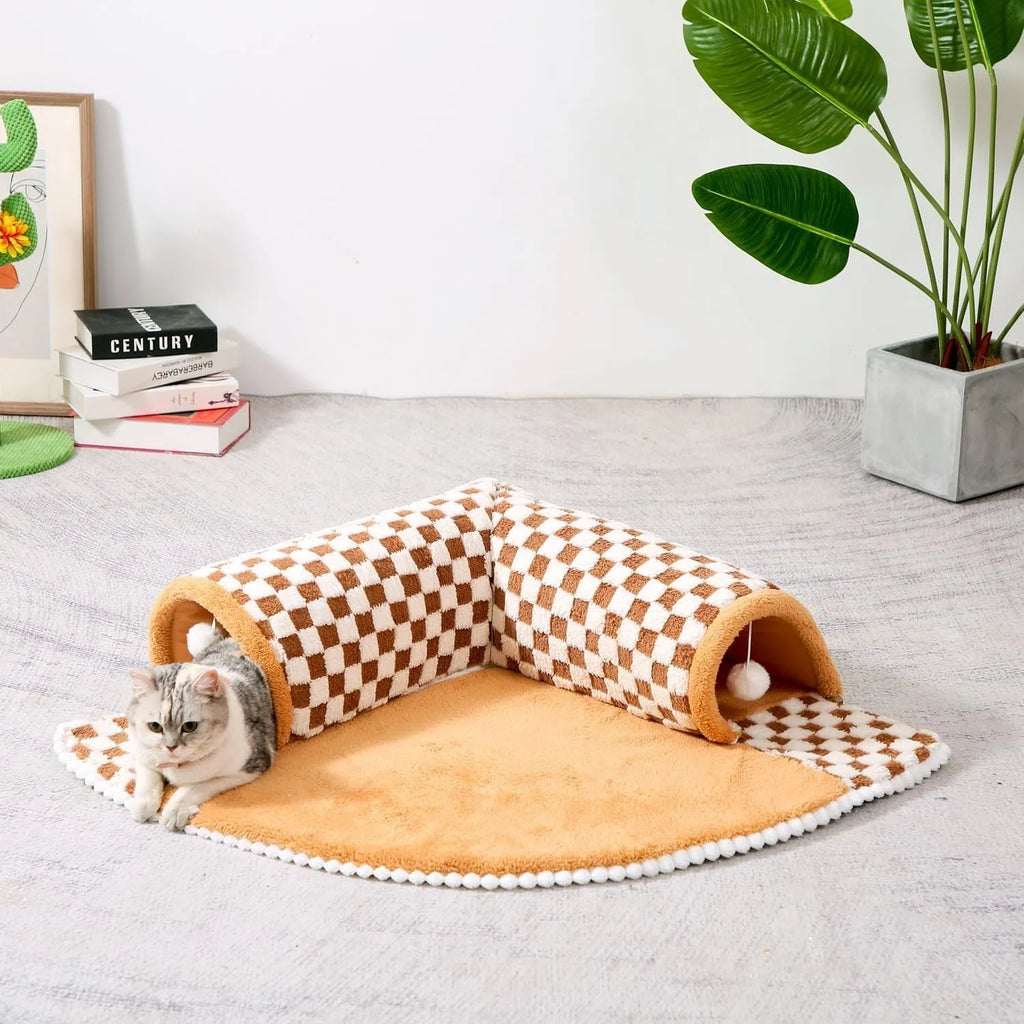 XL fan-shaped plush pet bed for dogs and cats with integrated tunnel in a plaid pattern.