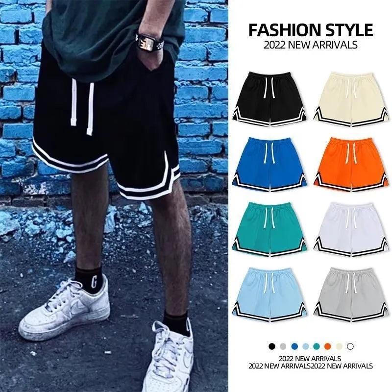 Men's loose sport shorts in polyester fabric available in nine colours including black, white, apricot, and blue shades
