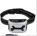 Electronic dog bark collar with digital display and adjustable black nylon strap.