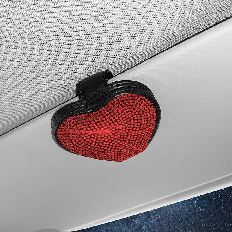 Black PU leather magnetic car sun visor clip holding sunglasses with a slot for tickets.