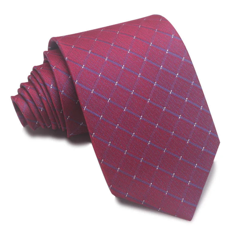 Close-up of a red, black, and blue striped men's formal tie with a textured Jacquard weave.