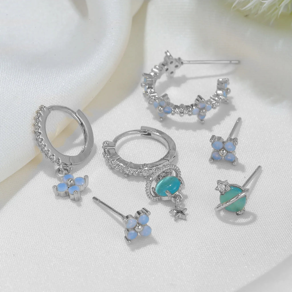 Blue protein flower nail ear studs with zircon mosaic details in gold or silver colour