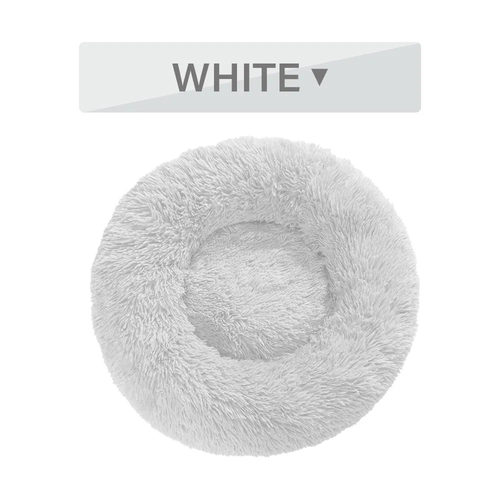 Donut-shaped long plush pet bed with raised sides, shown in a neutral colour.