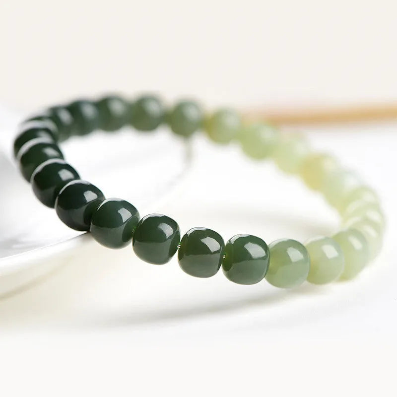 Natural Hetian jade water gradient bracelet with polished oval beads in unisex casual style