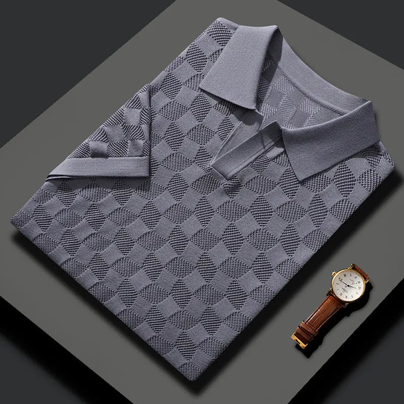 Man wearing a short sleeve mulberry silk sweater with lapels in a solid colour for business casual attire.