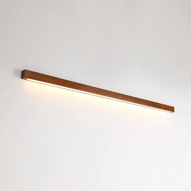 Modern walnut colour wood and acrylic strip wall lamp available in 60cm, 80cm, and 120cm lengths with LED lighting.