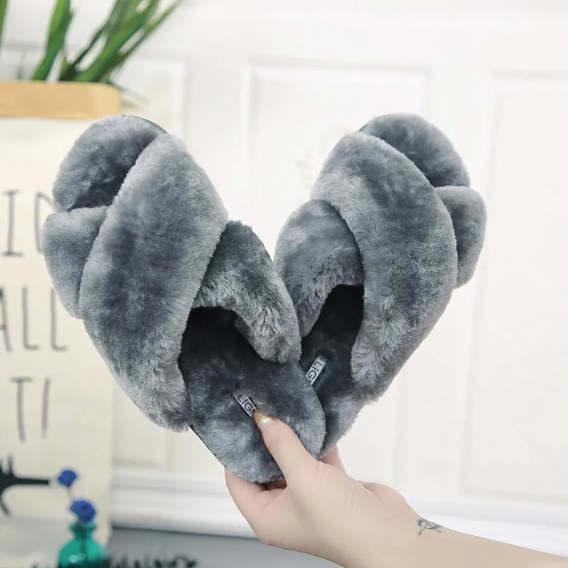 Women's black cross open-toe fur slippers with a patterned anti-slip sole.
