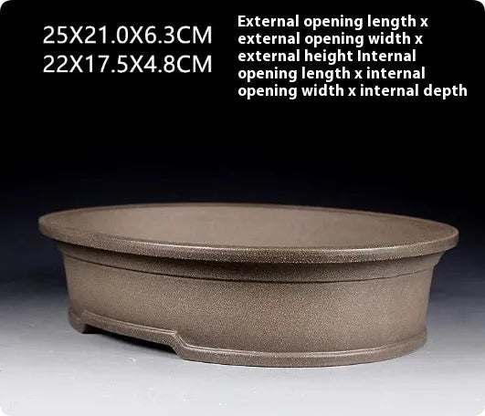 Handmade oval purple sand clay bonsai pot measuring 25x21x6.3cm for succulents