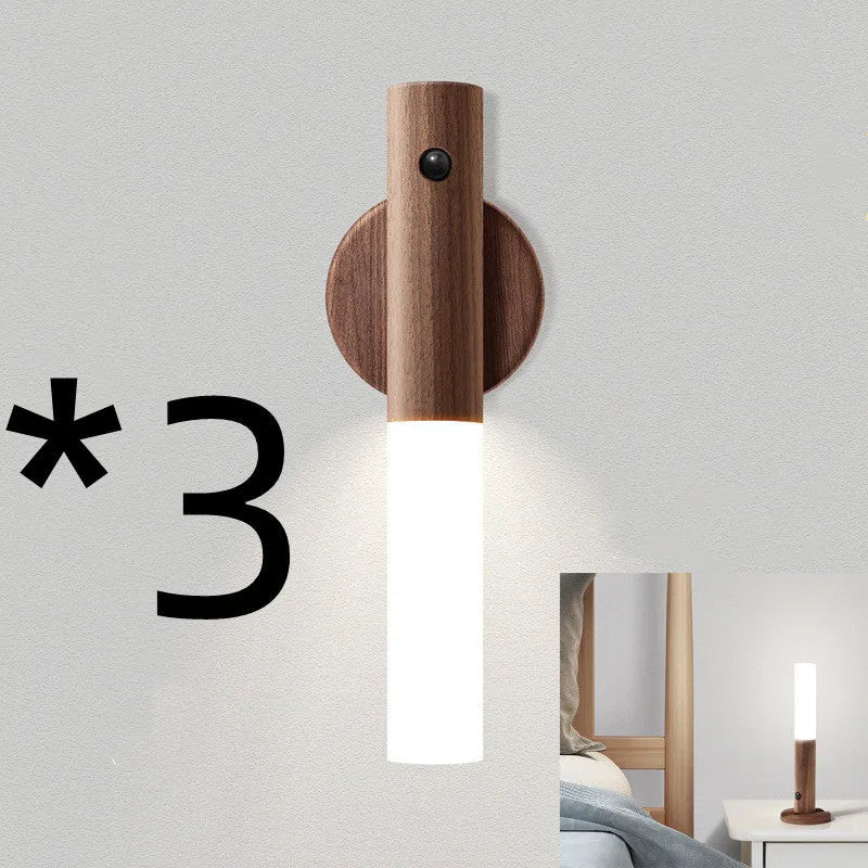 Smart sensor LED desk lamp in wood and glass, showing compact size and warm white light.