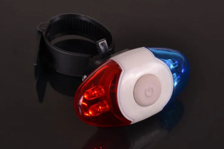 Red and blue LED tail light with adjustable base for cycling safety