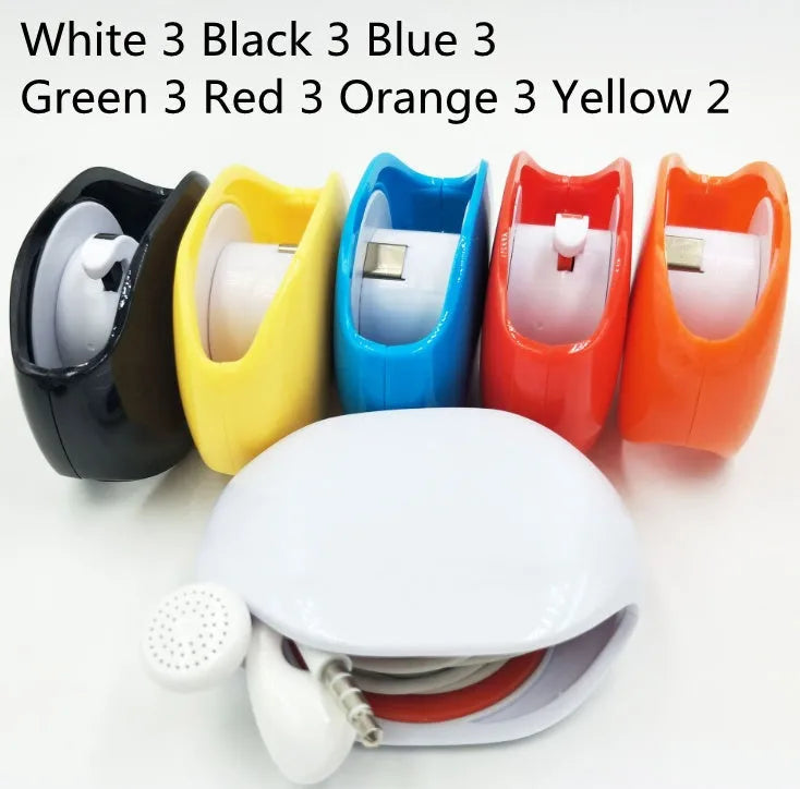 Automatic earphone retractor winder in black with extended cable showing push-type mechanism