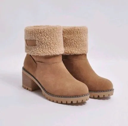 Women's thick suede mid-calf snow boots with a round toe, flat low heel, and waterproof platform sole.