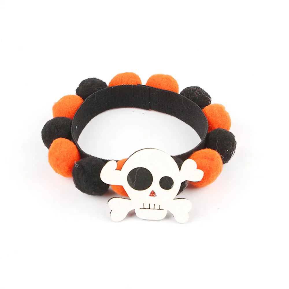 Halloween pet collar with a fur ball decoration in a pumpkin design, shown in size M