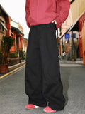 Men's straight cut pleated trousers in apricot colour with elastic waistband