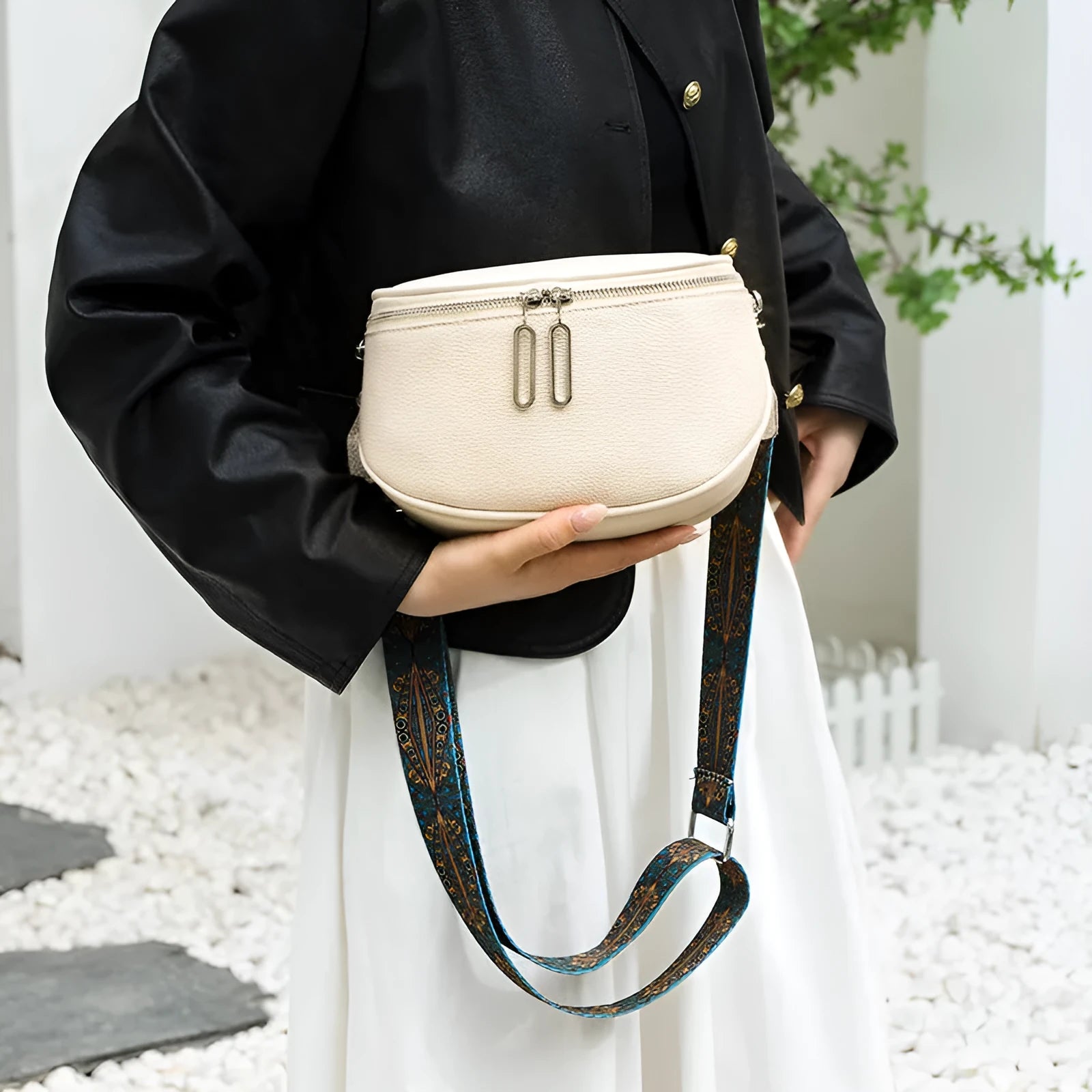 Soft PU women's messenger bag in saddle shape with single shoulder strap, shown in available colours