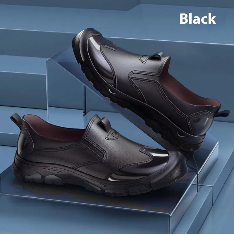 Short tube PVC wading shoe covers with round toe and non-slip plastic sole in solid colour.