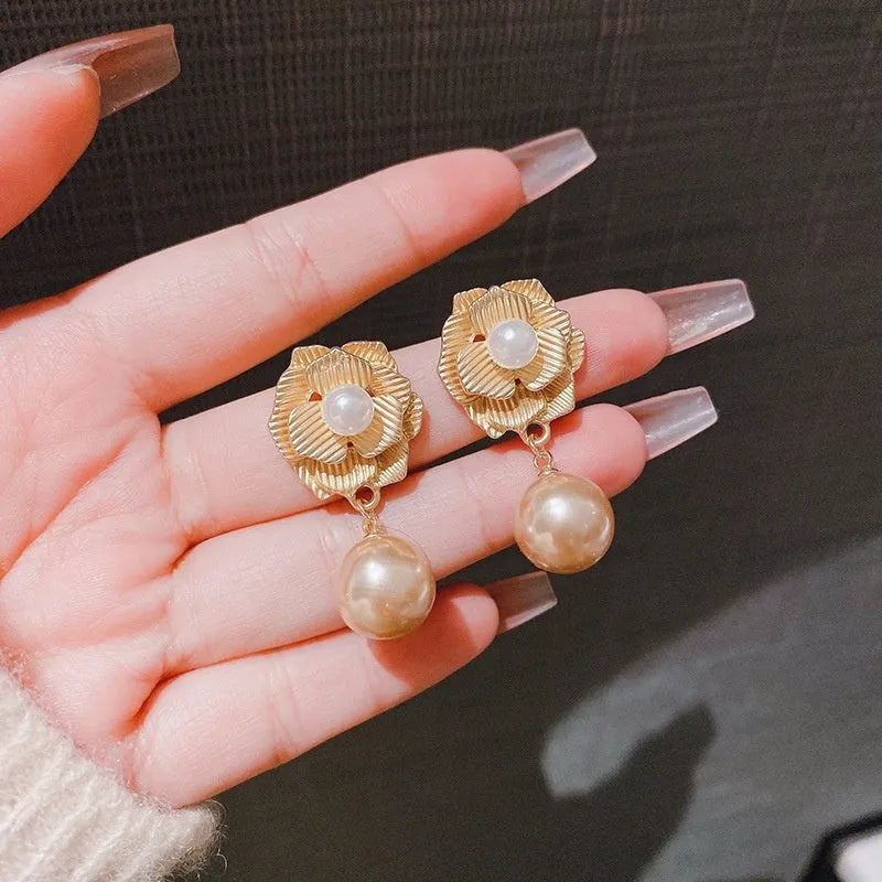 Gold colour flower stud earrings with rose pearl centre and opal stone details