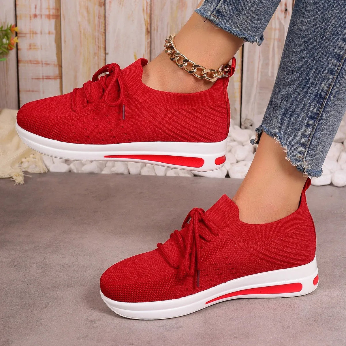 Women's fly-knit casual sneakers in black blue and red with artificial PU upper and low top design