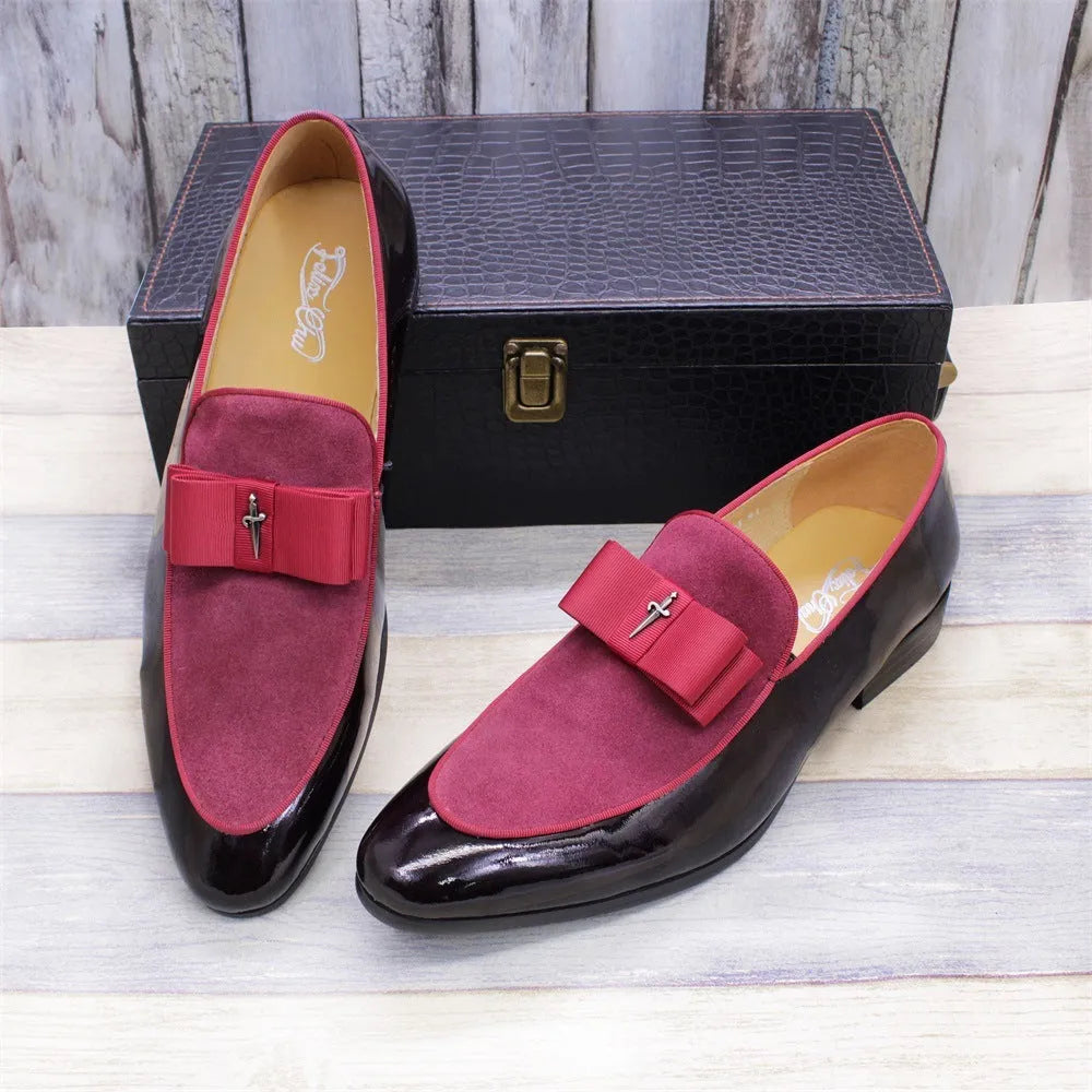 Men's black patent leather low-top shoes with a gold tassel detail and rubber sole.
