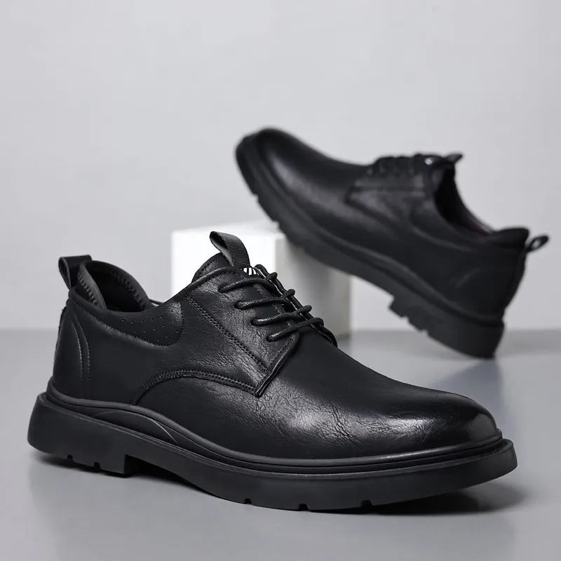Men's black leather shoes with decorative sewing lines and rubber soles for business and wedding wear