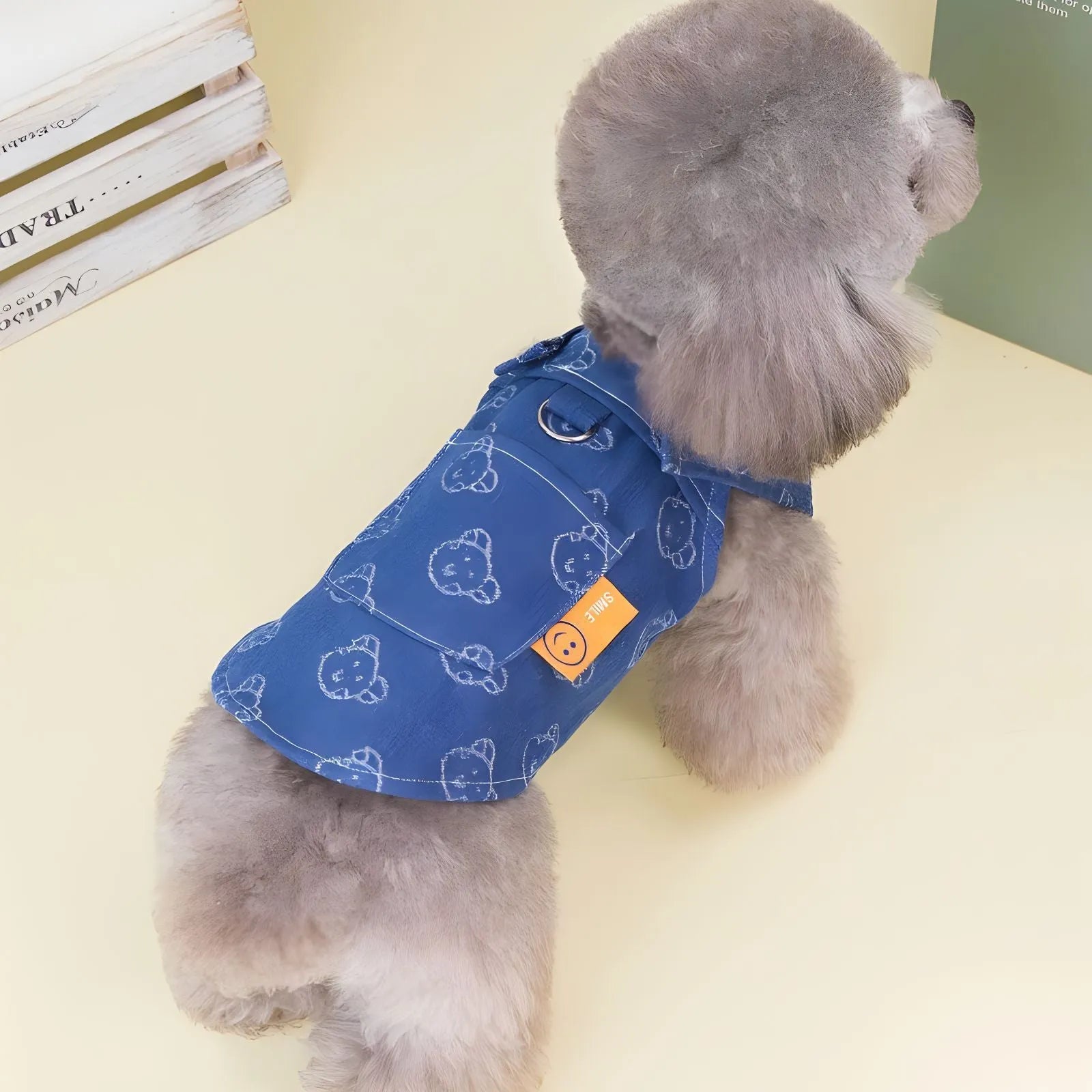 Denim princess dress for small dog on hanger showing bracket detailing and lightweight construction