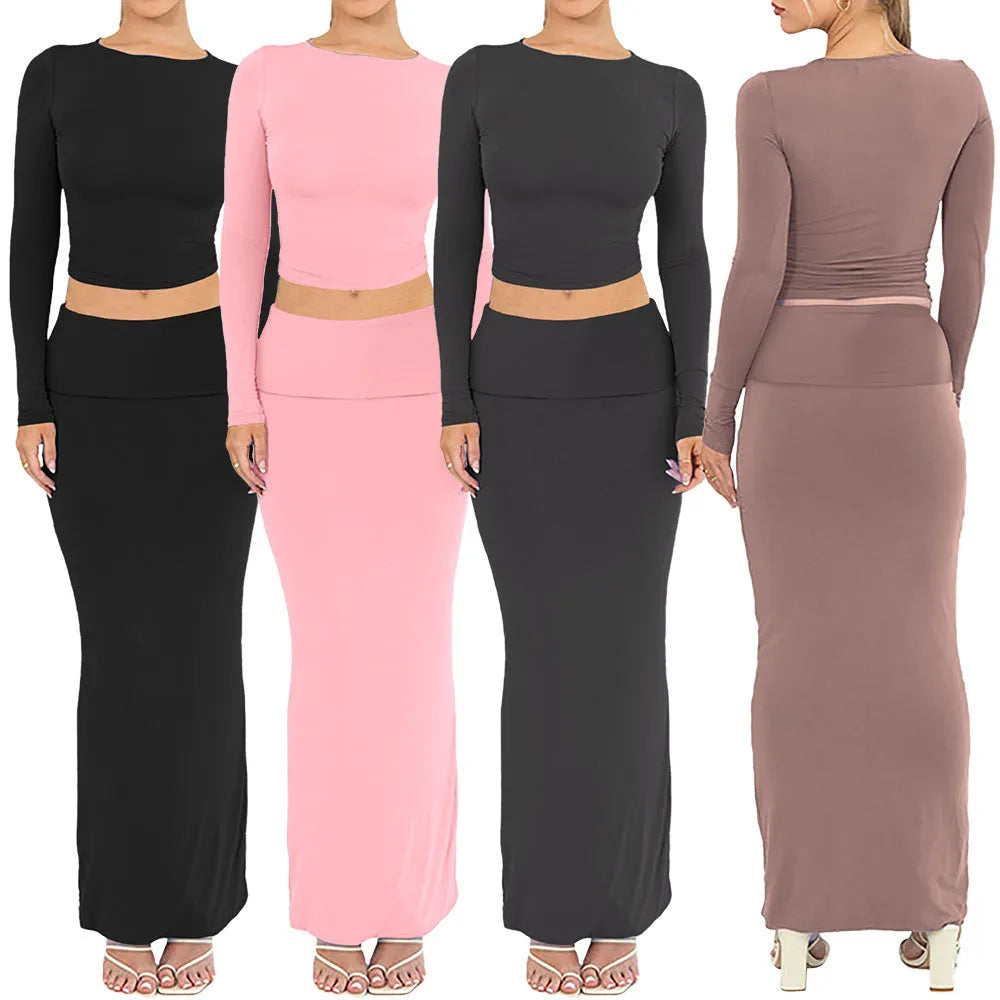 Women's black sweet style polyester two-piece suit with exposed navel and three-quarter sleeves.