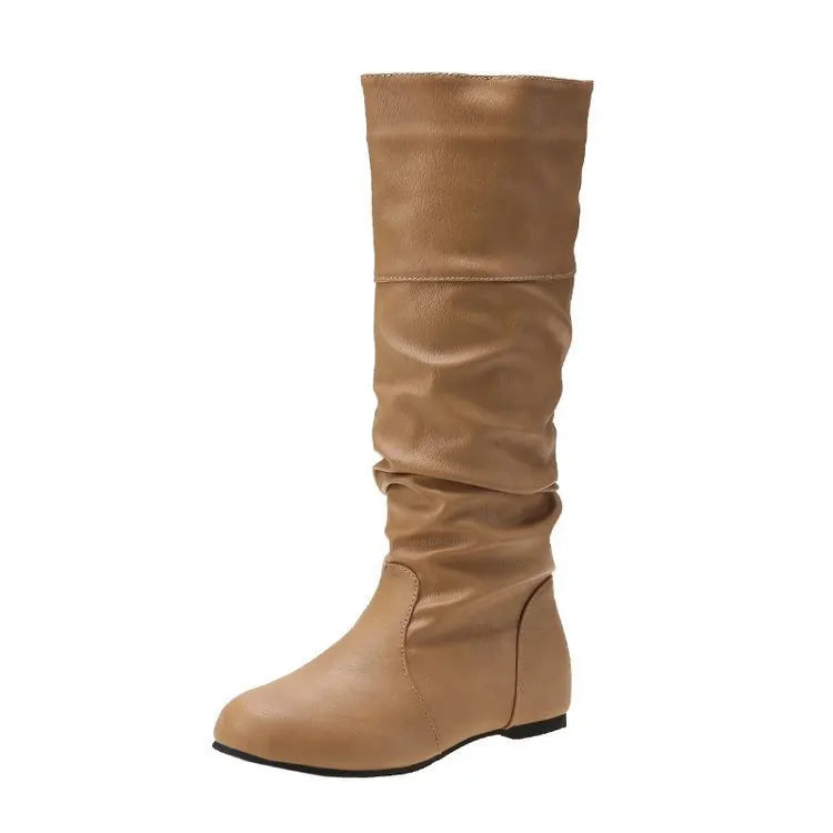 Women's slip-on flat ankle boots in artificial PU leather with high shaft and rubber sole