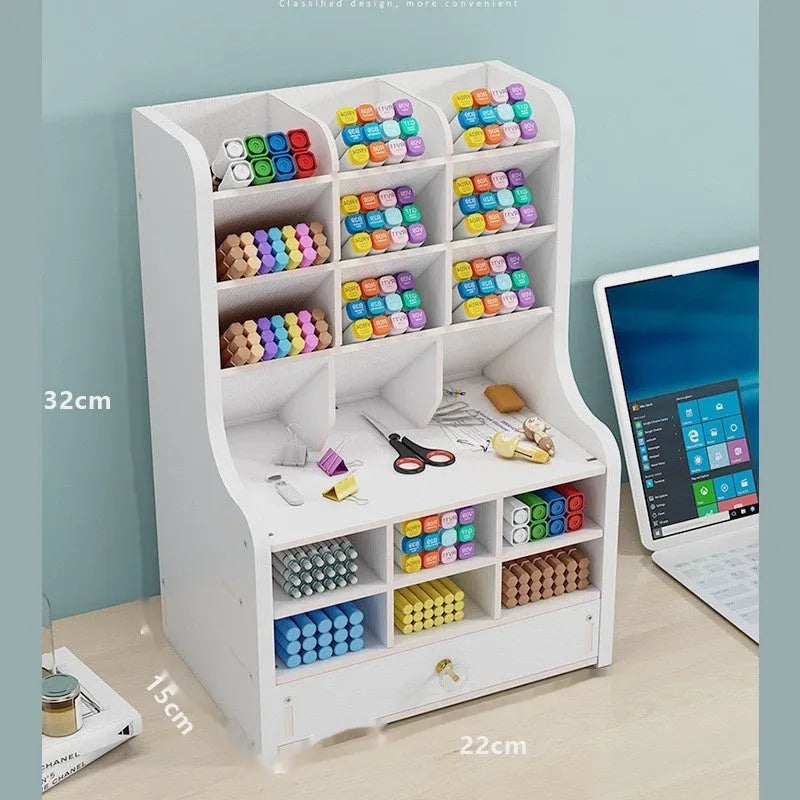 Square plastic pen holder storage box with multiple oblique insertion compartments on a desk.