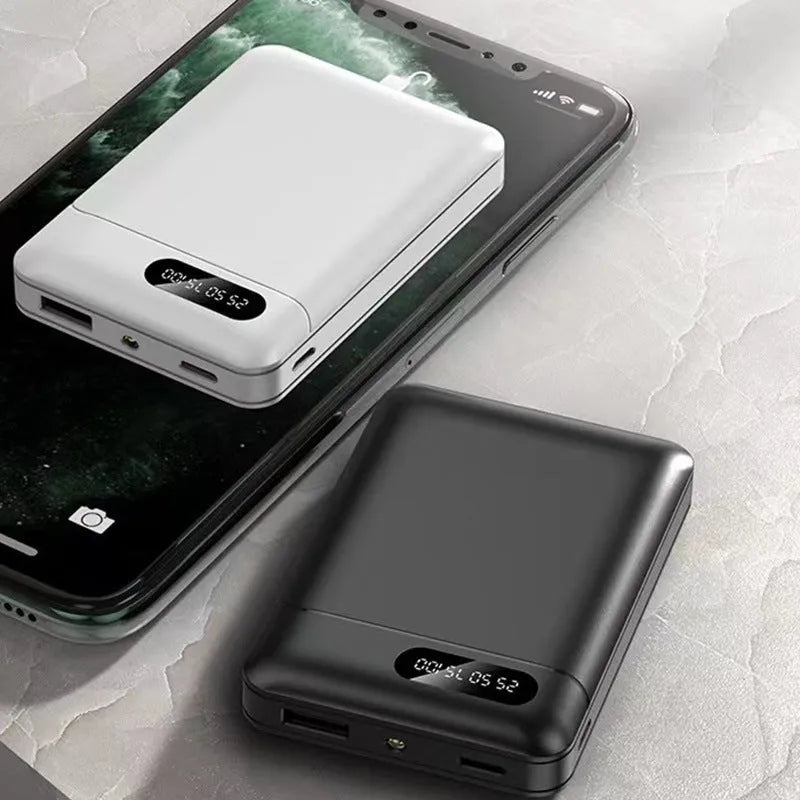 Black or white portable power bank with USB ports showing 10000mAh capacity for mobile device charging