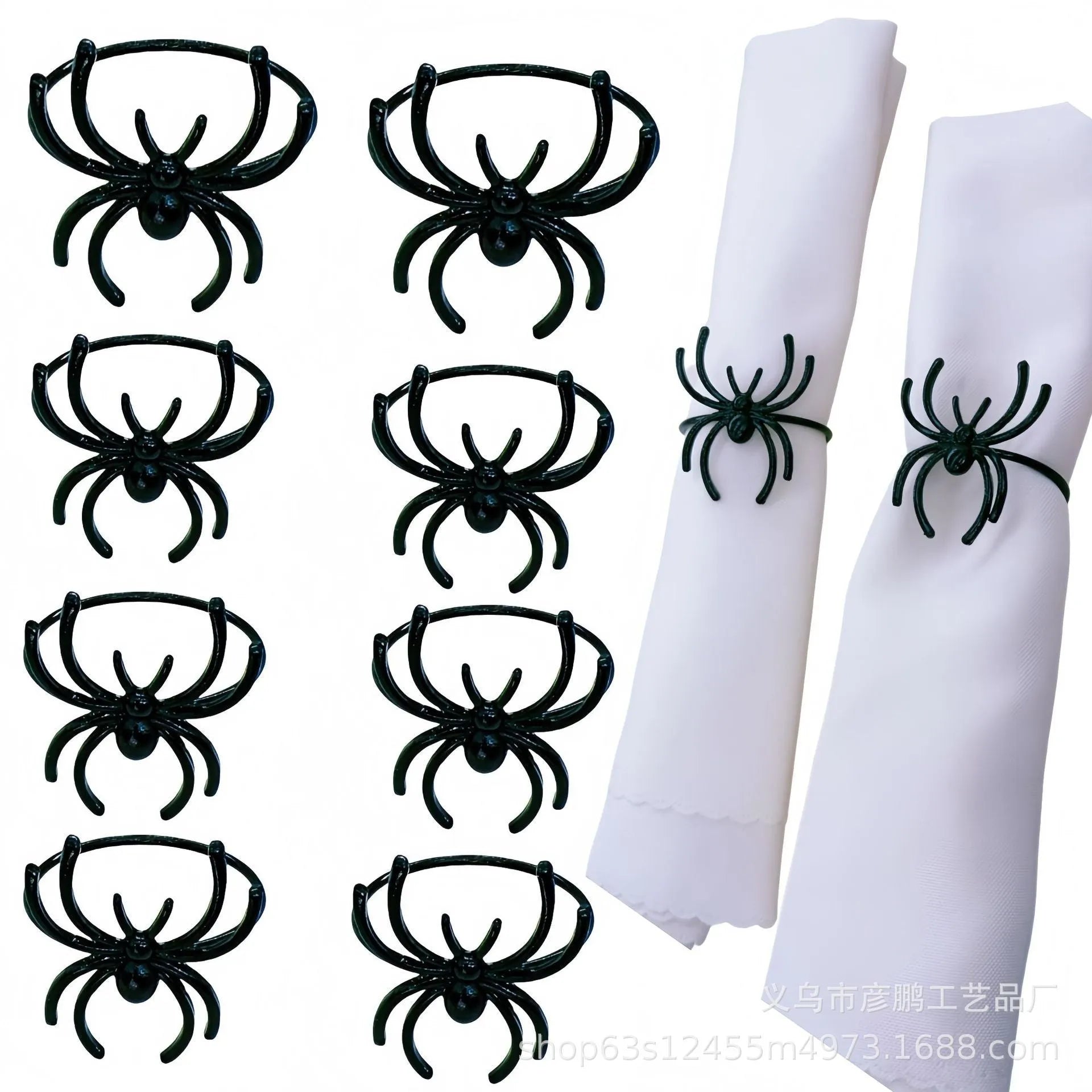 Set of six black alloy napkin rings with spider design for Halloween table decoration.
