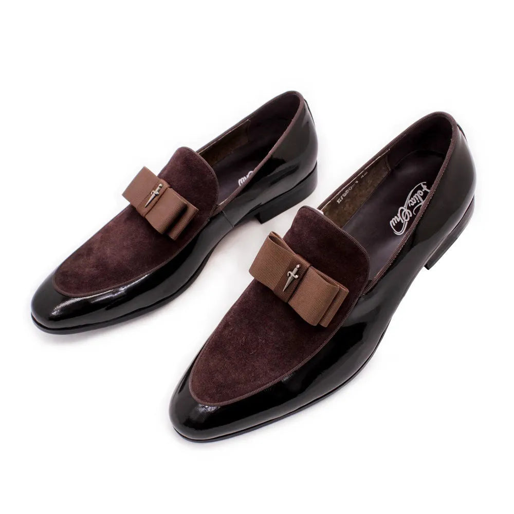 Men's black patent leather low-top shoes with a gold tassel detail and rubber sole.