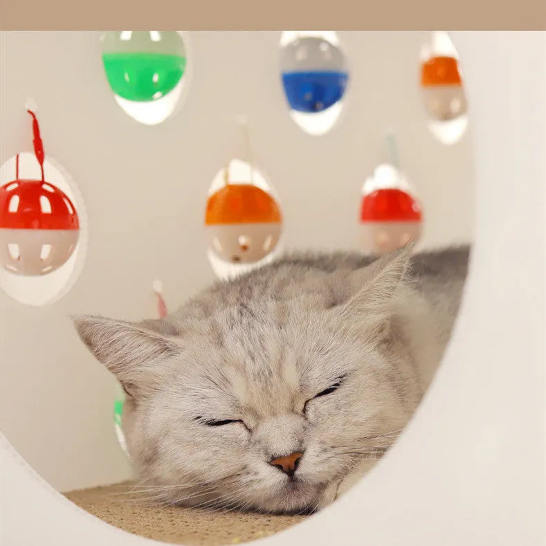 Plastic cat scratch board integrated with a nesting house and tunnel, includes a toy.