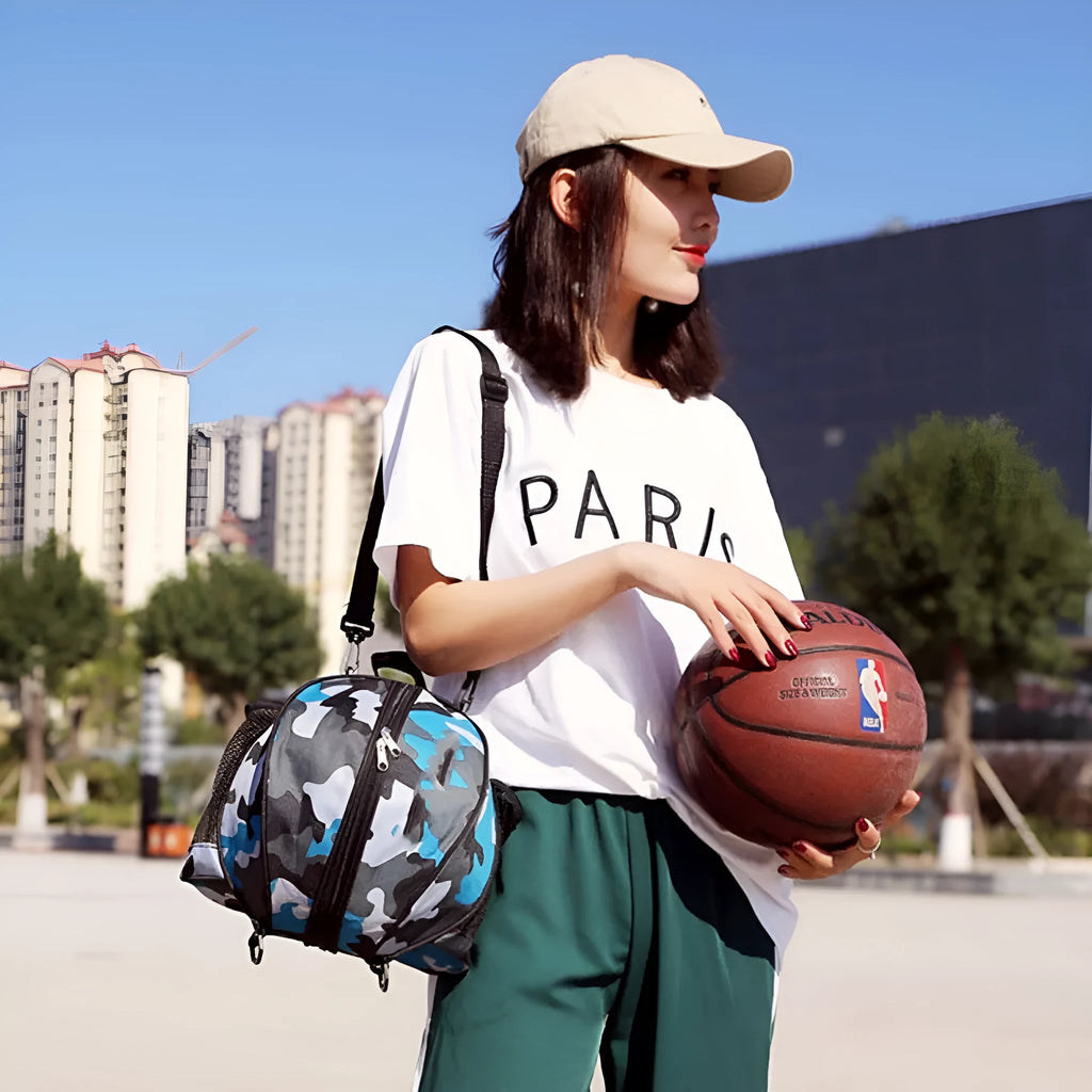 Oxford cloth basketball bag with 9L capacity in black or camouflage featuring one-shoulder and two-shoulder straps