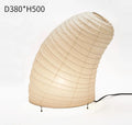 Japanese style rice paper table lamp with aluminium base and handmade shade showing three-tone dimming control