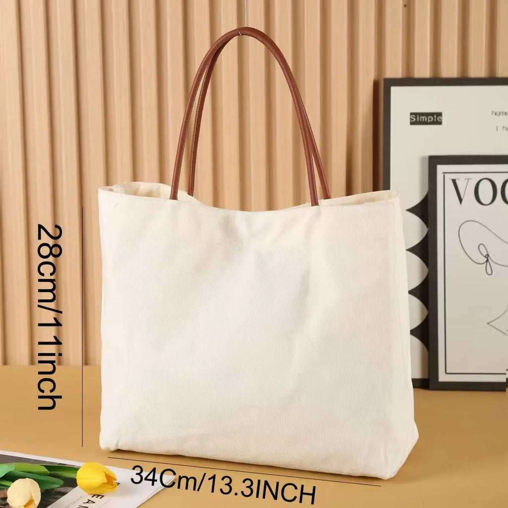 Canvas tote bag in cotton fabric with reinforced stitching, shown in beige white and white colour options