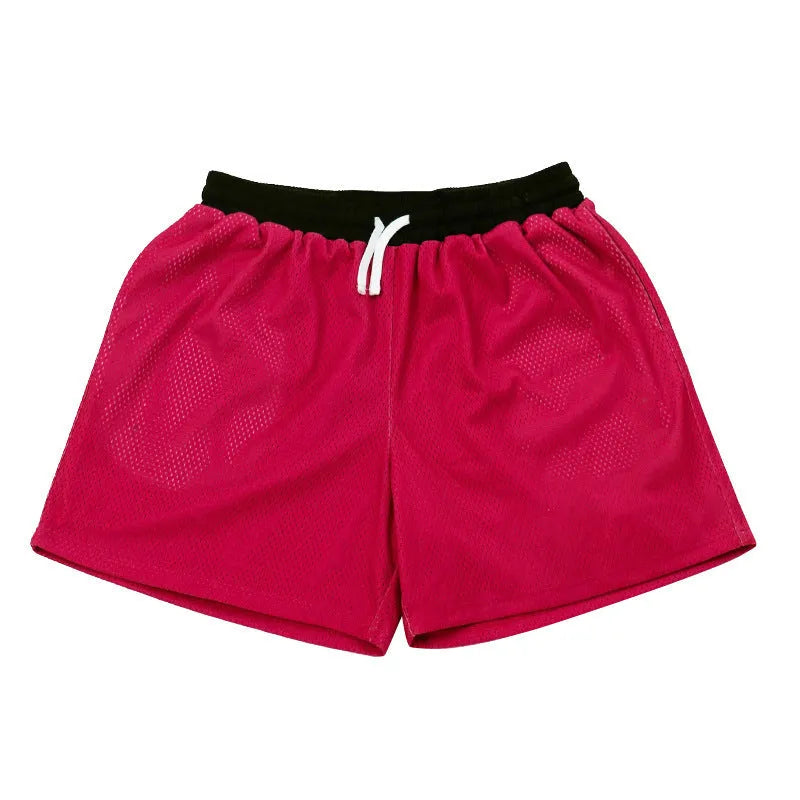 Men's mesh quick-drying sports shorts in solid colours for athletic activities