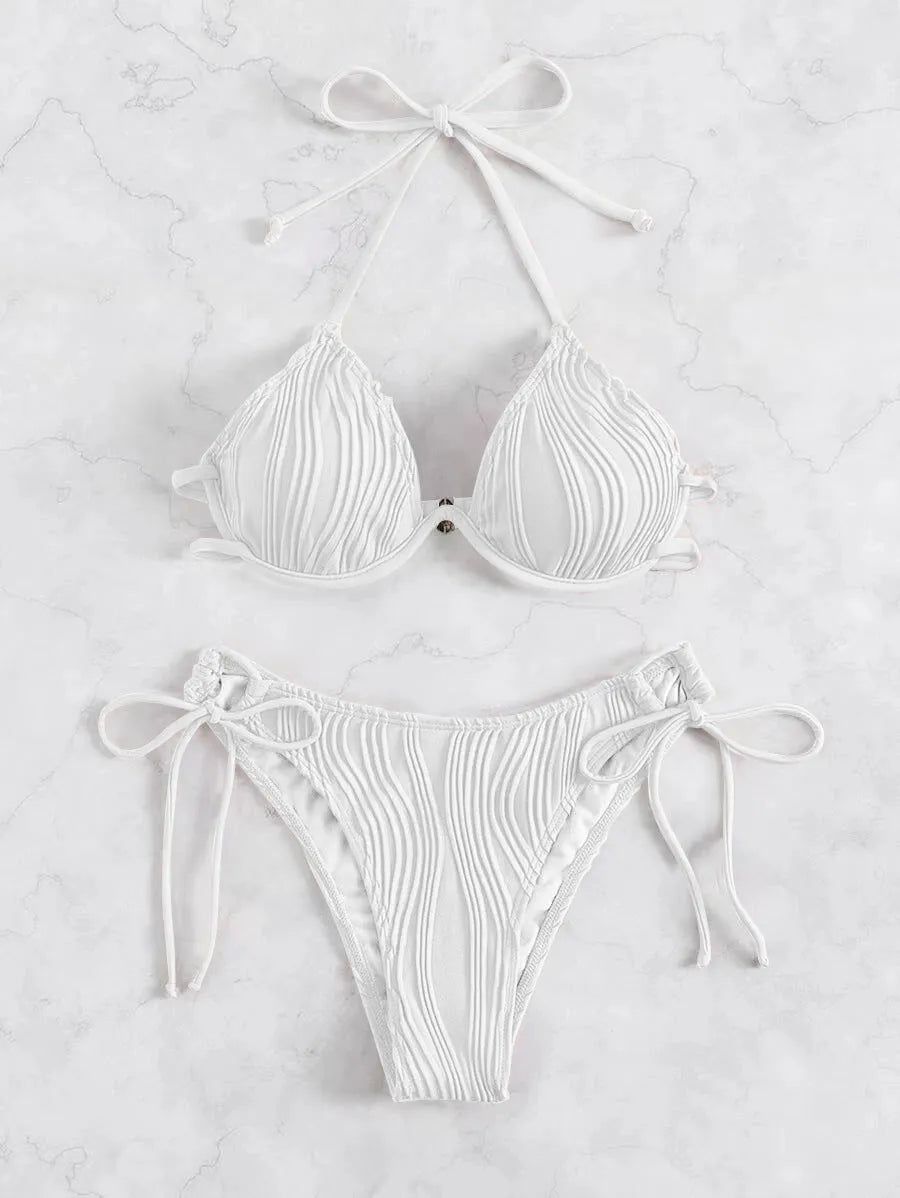Women's apricot coloured split bikini swimsuit with steel wire bracket support.