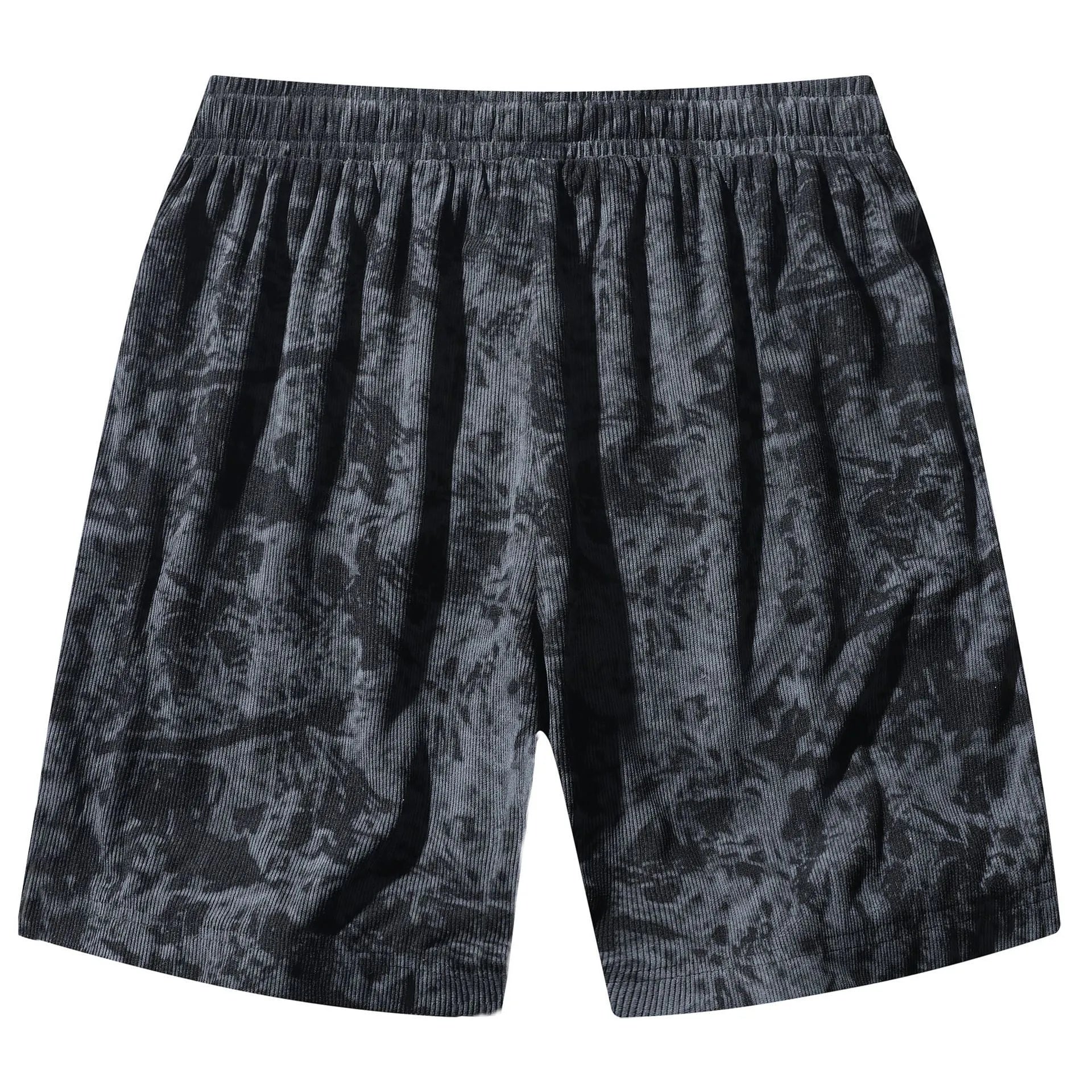 Men's camouflage pattern corduroy shorts with an elasticated high waistband on a plain background.
