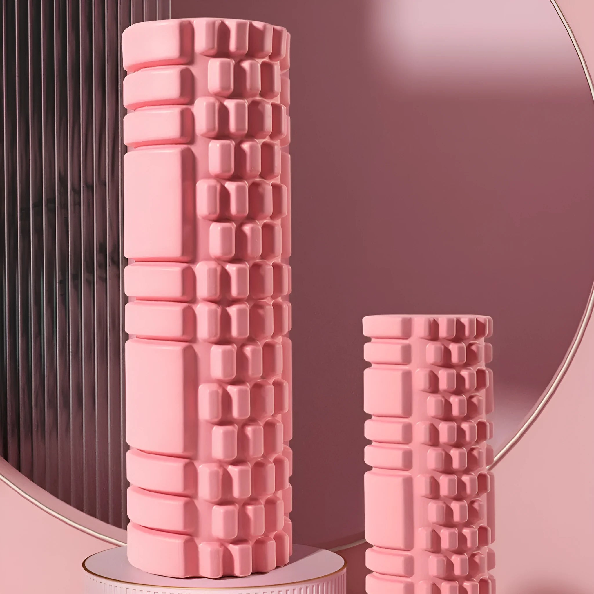 Black cylindrical EVA foam roller for fitness muscle recovery on a plain background.