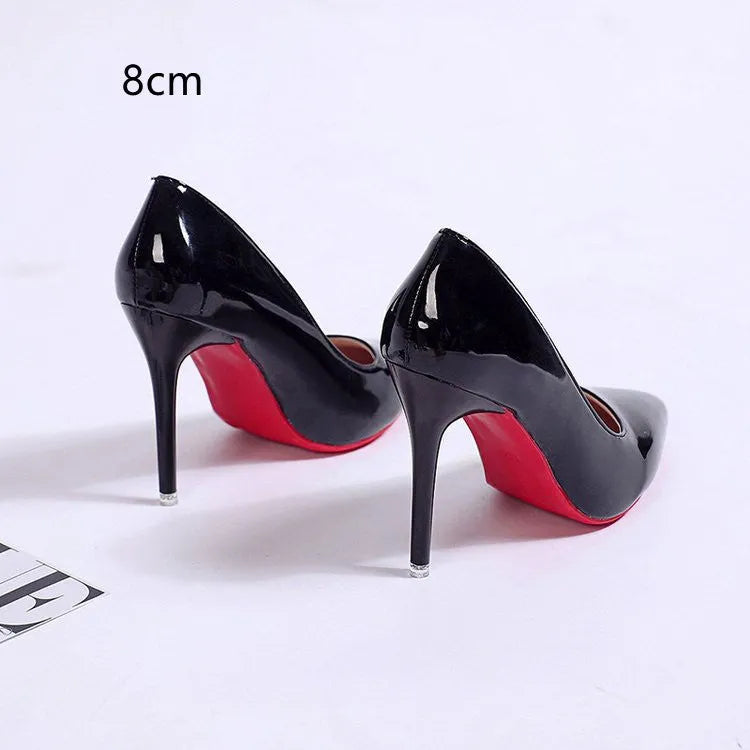 Women's pointed toe stiletto heel pumps in solid colours with shallow mouth opening
