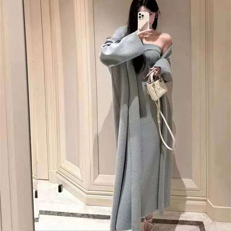 Women's grey knitted cardigan dress suit with matching coat, showing flocked pattern detail.