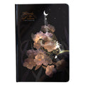 A5 notebook with a luminous cover in one of four colours, open to show pages with colour illustrations