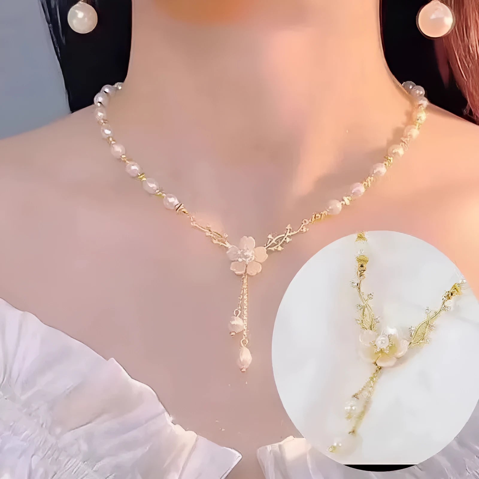 Alloy pearl necklace with floral and rose design elements on a pearl chain.