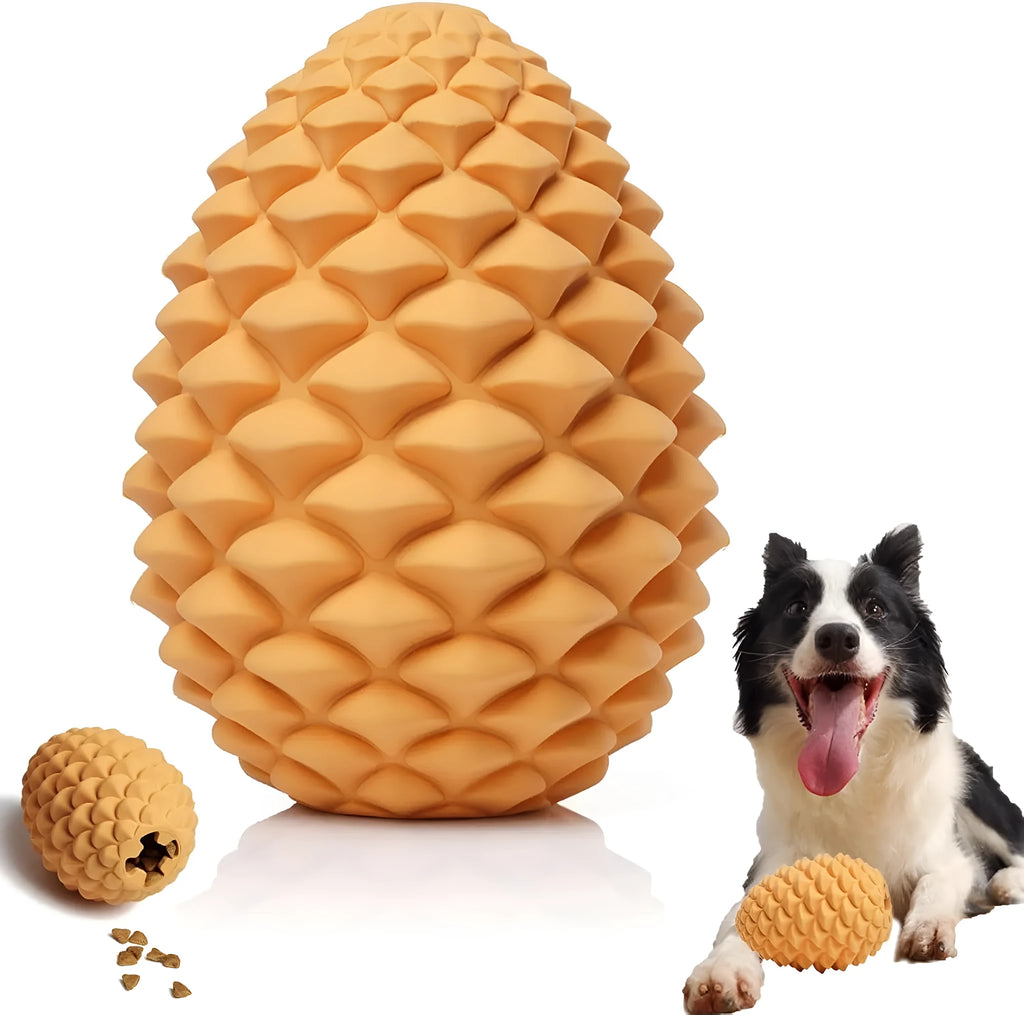 Yellow natural rubber pine cone-shaped dog chew toy with treat dispenser hole.