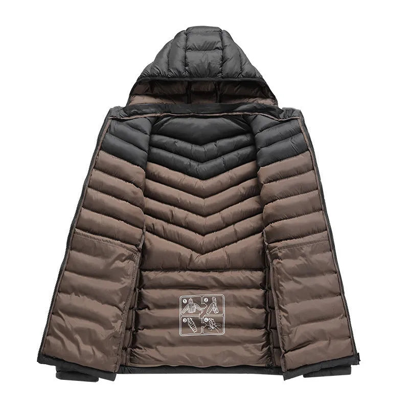 Man wearing a lightweight army green down jacket with a detachable hood and zipper pockets.