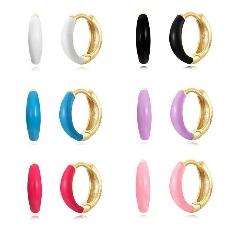 Geometric U-shaped silver earrings with an oval epoxy resin centre in a choice of seven colours.