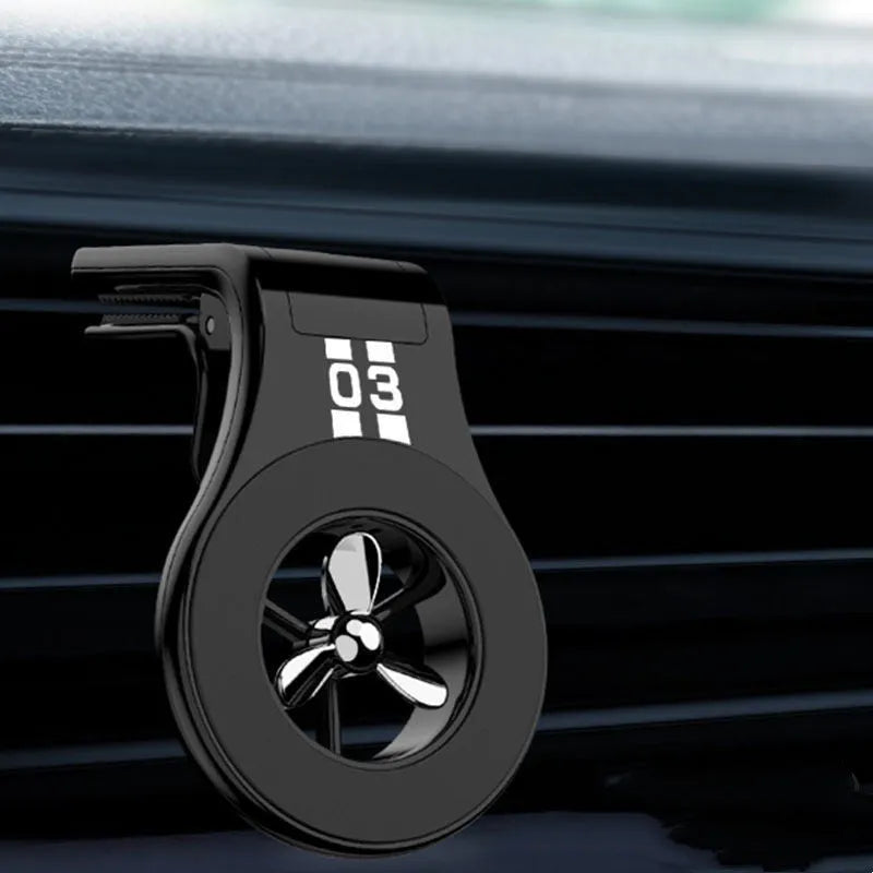 Magnetic car phone holder mounted on car air vent with smartphone attached