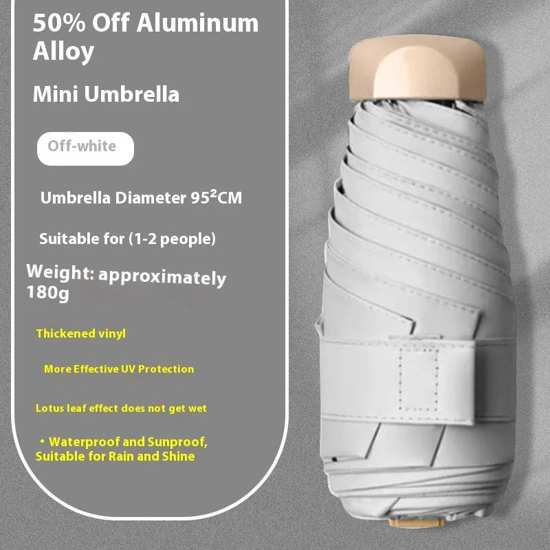 Five-fold manual umbrella with gradient vinyl sunshade showing six alloy bones in beige colour option